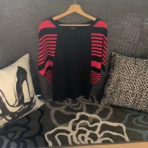 Women’s light, soft, mid sleeve sweater.